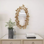 Specchio da parete farfalla Glam Metal oro - Olivia & May: Struttura in ferro, forma rotonda, nessun montaggio richiesto
