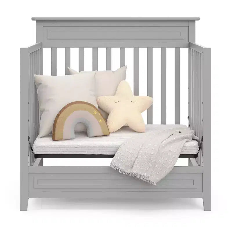 Culla trasformabile 4-in-1 Storkcraft Petal con materasso