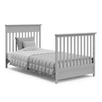 Culla trasformabile 4-in-1 Storkcraft Petal con materasso