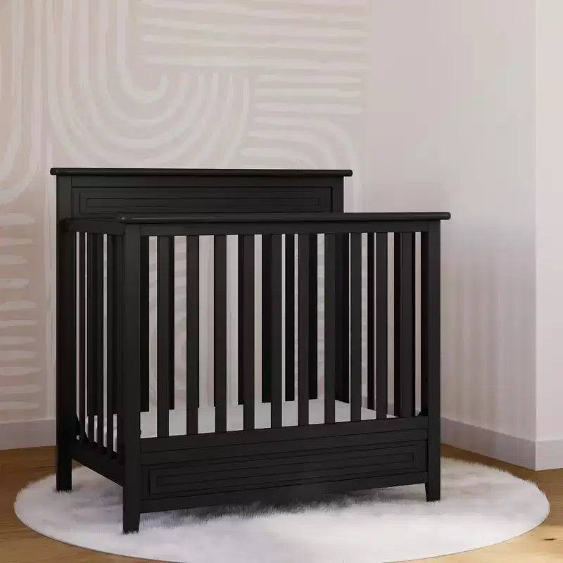 Culla trasformabile 4-in-1 Storkcraft Petal con materasso