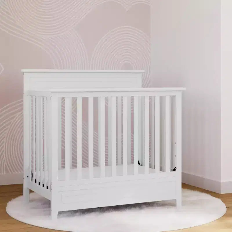 Culla trasformabile 4-in-1 Storkcraft Petal con materasso