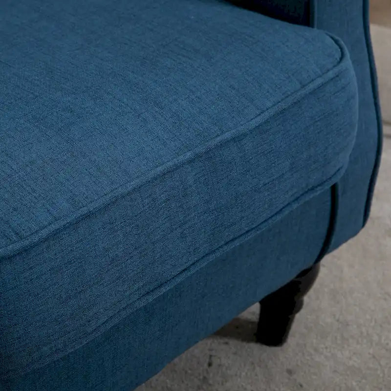 Poltrona accent blu con schienale ad ali, capitonné, monosedile