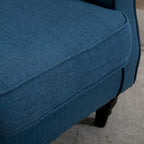 Poltrona accent blu con schienale ad ali, capitonné, monosedile
