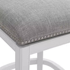 Sgabello Miranda girevole altezza bancone Bianco: schienale imbottito, borchie decorative - Alaterre Furniture