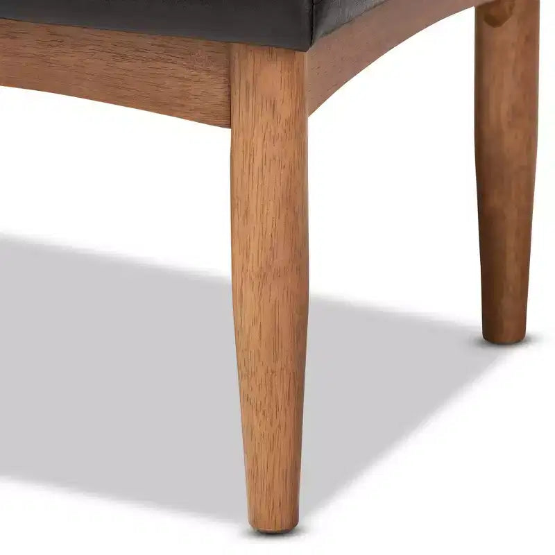 Panca da pranzo Arvid in ecopelle e legno imbottita marrone scuro/noce - Baxton Studio