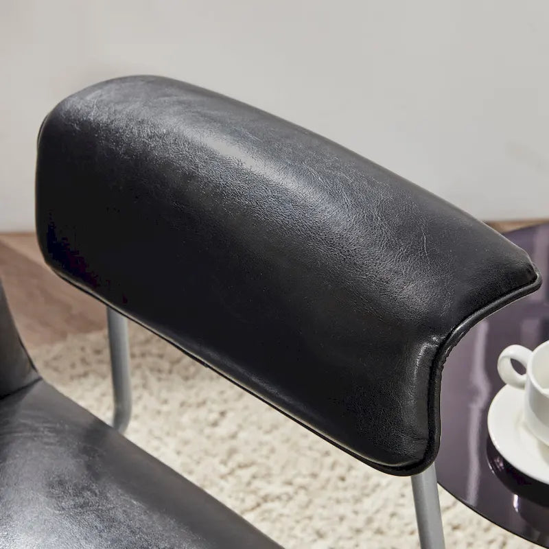 Poltrona lounge in similpelle nera/marrone, a seduta singola