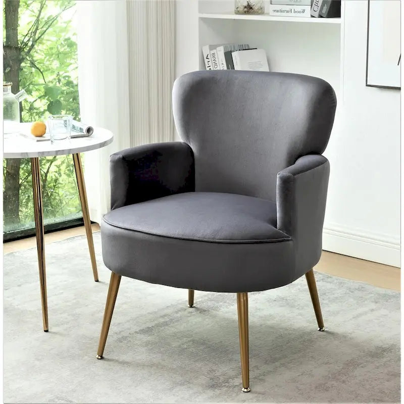 Poltrona con accenti in velluto e gambe in metallo dorato, vari colori, sedile singolo