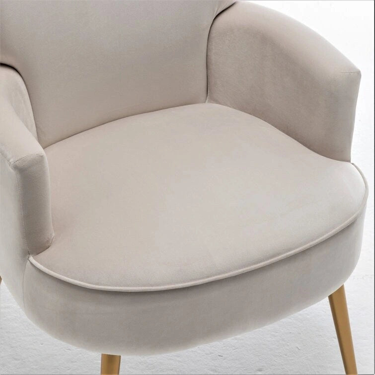 Poltrona con accenti in velluto e gambe in metallo dorato, vari colori, sedile singolo