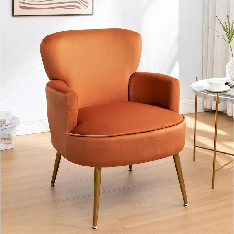 Poltrona con accenti in velluto e gambe in metallo dorato, vari colori, sedile singolo
