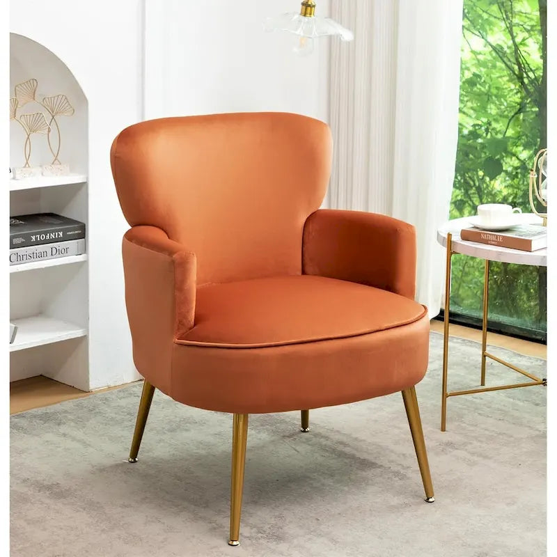 Poltrona con accenti in velluto e gambe in metallo dorato, vari colori, sedile singolo